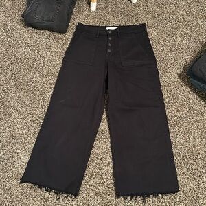 Boutique black wide leg crop jeans in size 28 with raw hem!